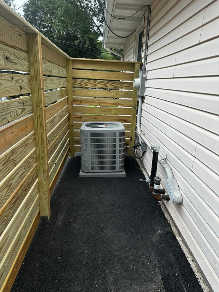 Custom wood fence installation at a Massachusetts home