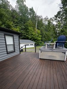 Professional deck painting Massachusetts before and after project
